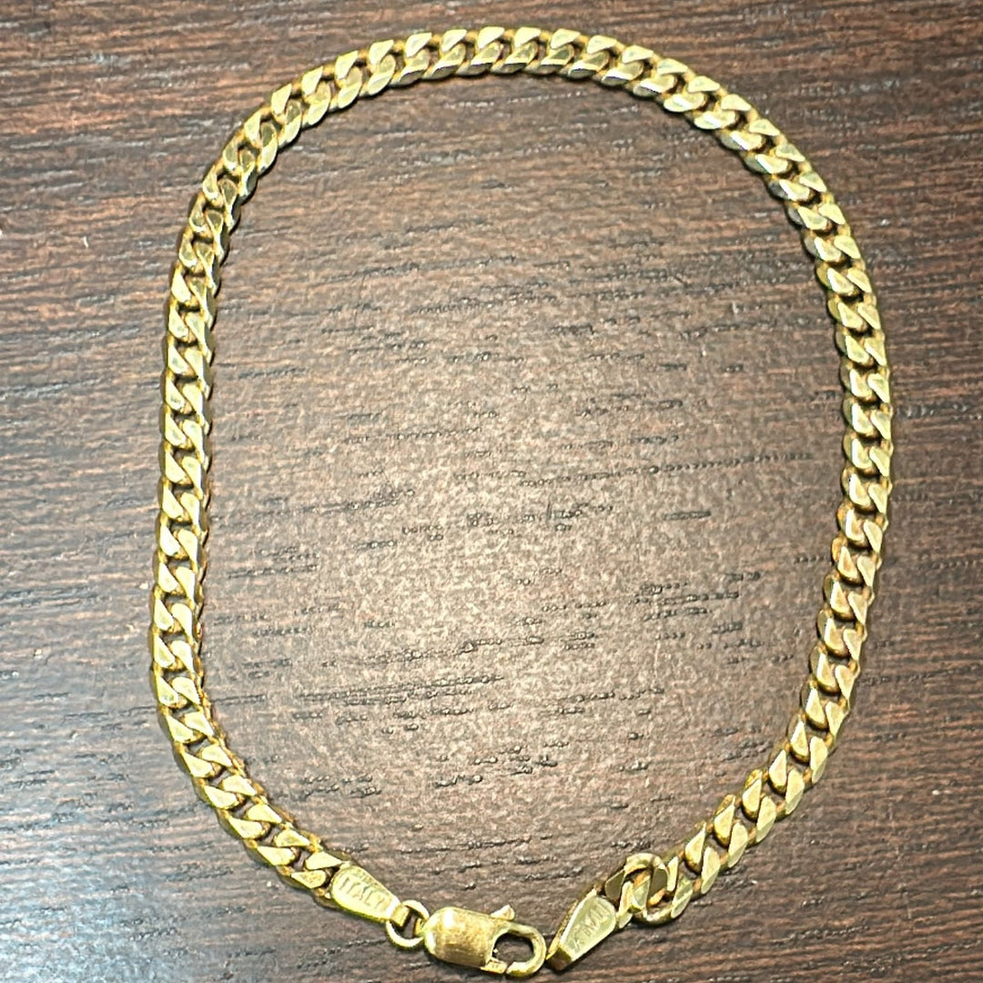 10K yellow gold flat beveled link bracelet, 7.23g weight, 8" length, with a lobster clasp.