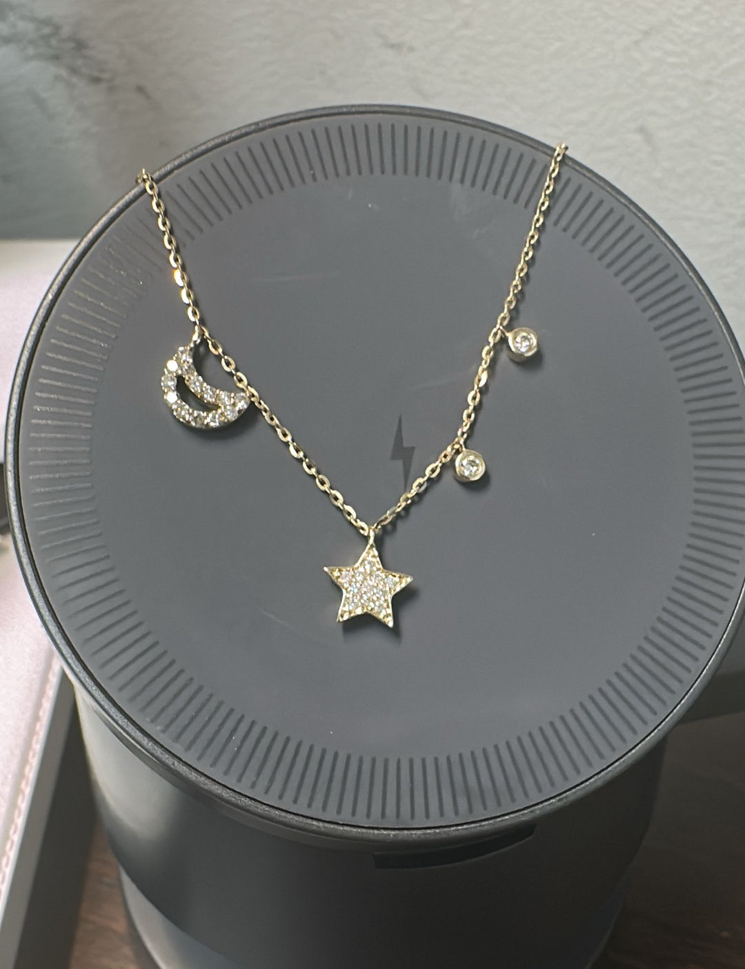 14K yellow gold diamond necklace with moon and star charms and adjustable 16–18" chain