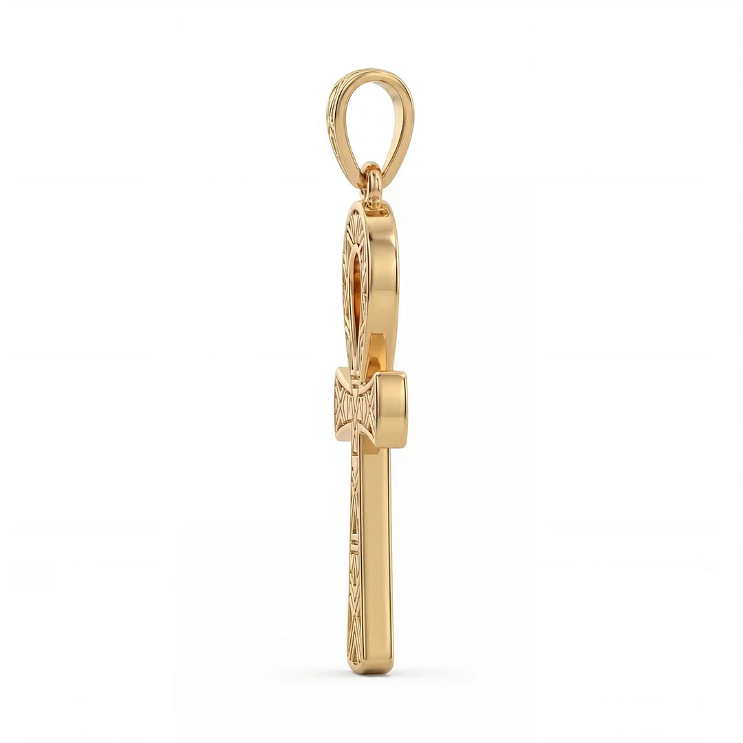 Ankh cross pendant necklace with engraved Egyptian pattern displayed on white background.