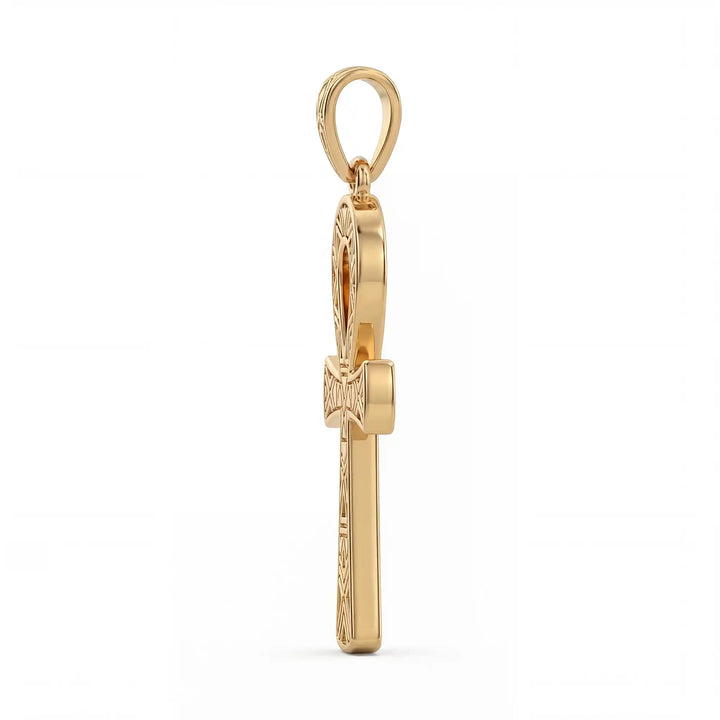 Ankh cross pendant necklace with engraved Egyptian pattern displayed on white background.