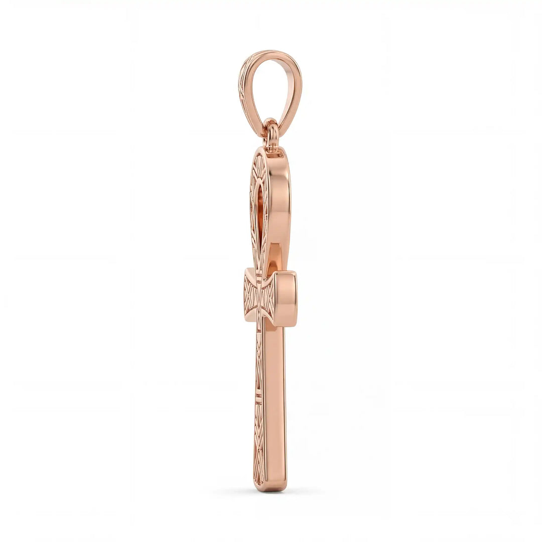 Ankh cross pendant necklace with engraved Egyptian pattern displayed on white background.