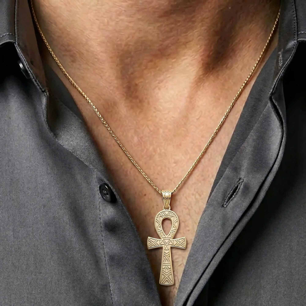 30mm Ankh cross pendant with smooth polished finish on chest.