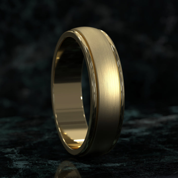 Brushed center domed men’s wedding band with rounded edges