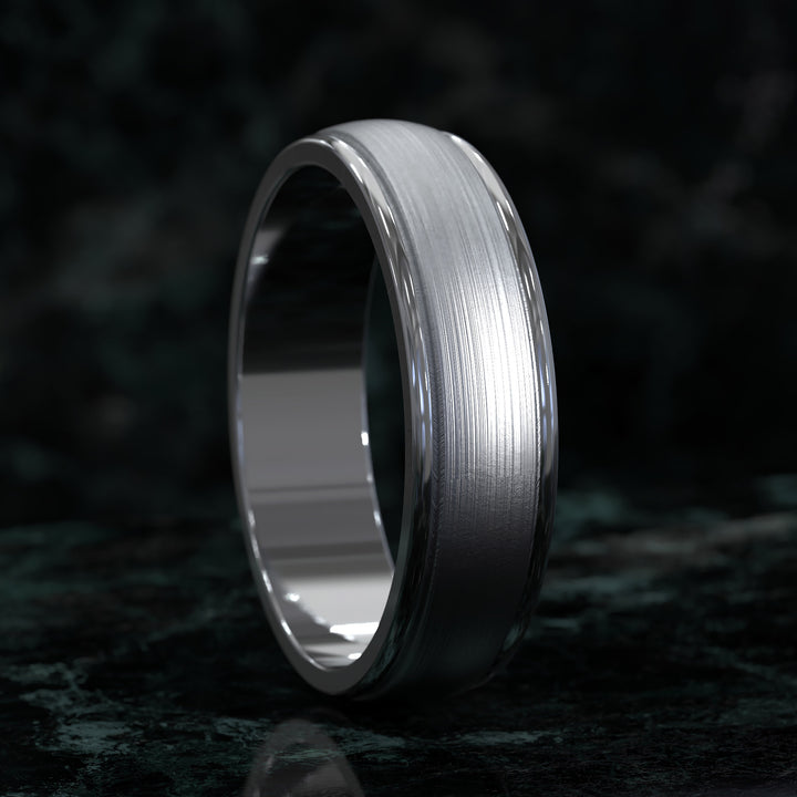 Brushed center domed men’s wedding band with rounded edges