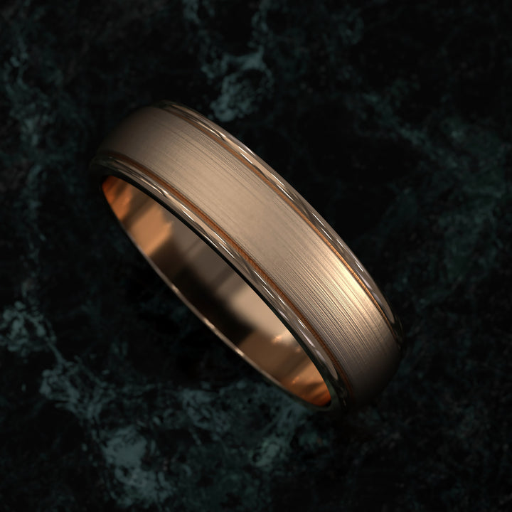 Brushed center domed men’s wedding band with rounded edges