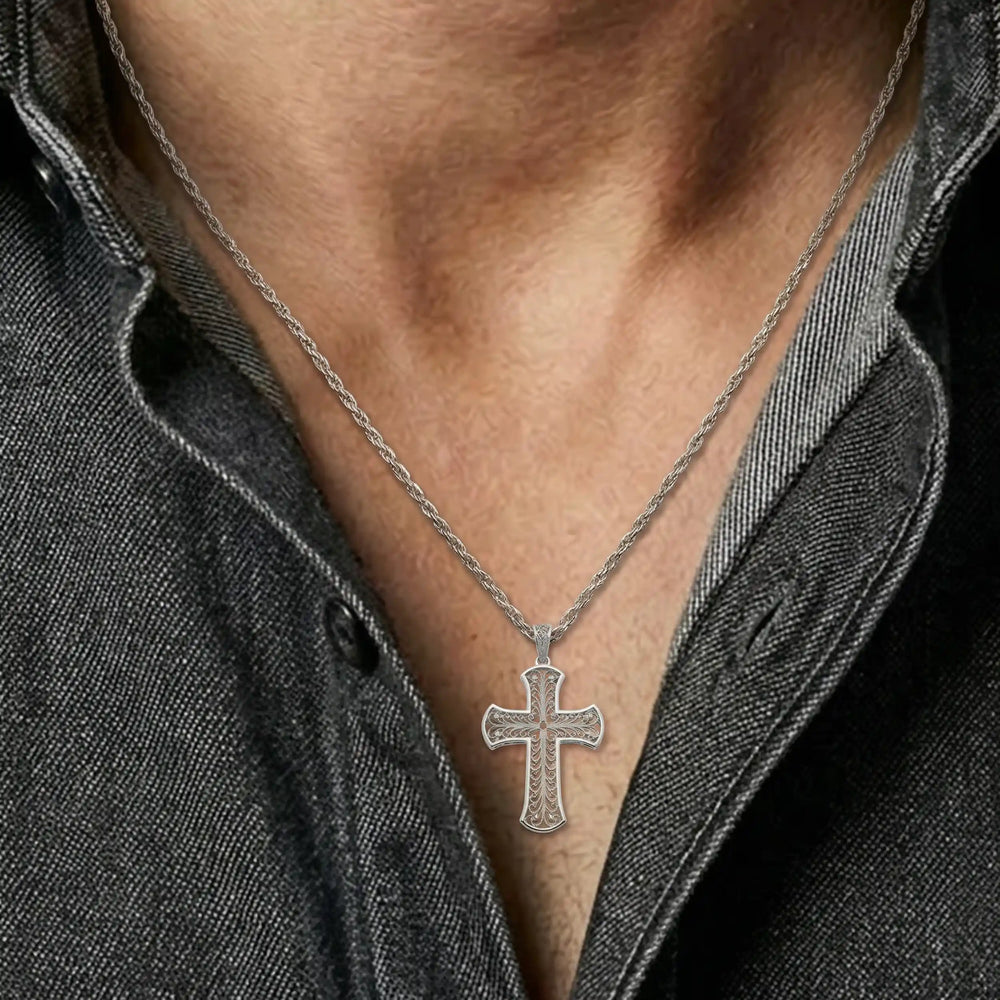 24mm Byzantine cross pendant with ornate filigree openwork design on chest.