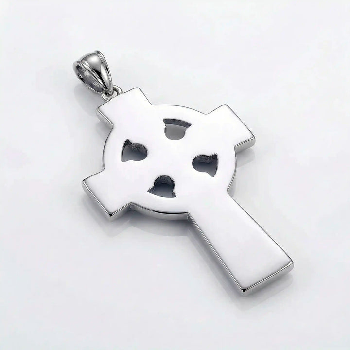 Celtic knot cross pendant necklace with circular halo design displayed on white background.