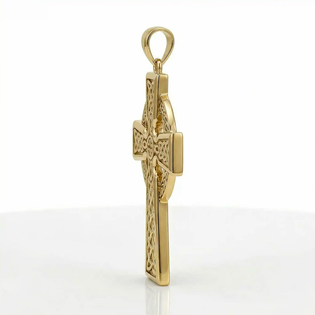 Celtic knot cross pendant necklace with circular halo design displayed on white background.