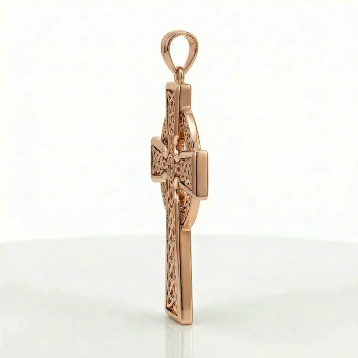 Celtic knot cross pendant necklace with circular halo design displayed on white background.
