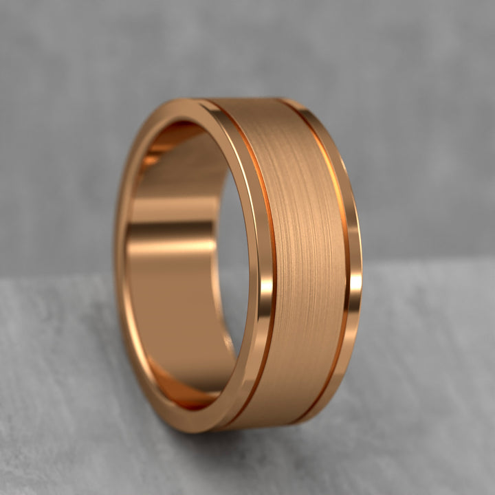 Center brushed men’s wedding band with polished double grooves