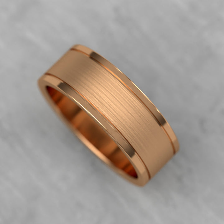 Center brushed men’s wedding band with polished double grooves
