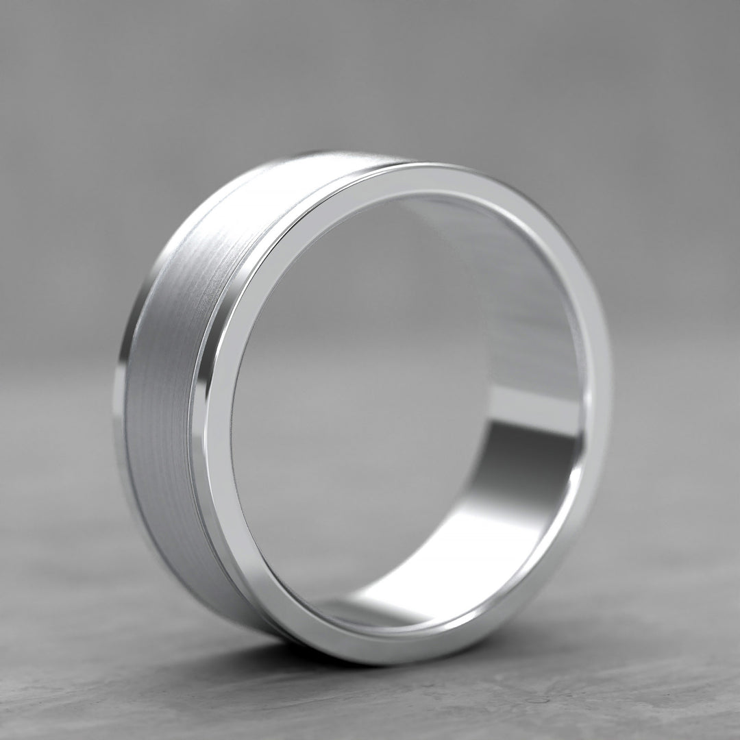 Center brushed men’s wedding band with polished double grooves