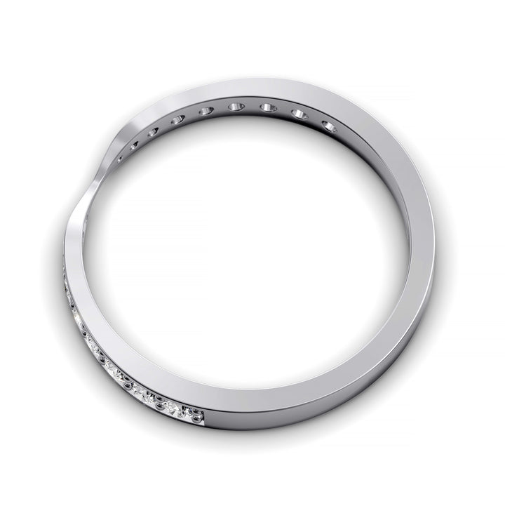 Channel set gold wedding band with tapered top and round brilliant stones