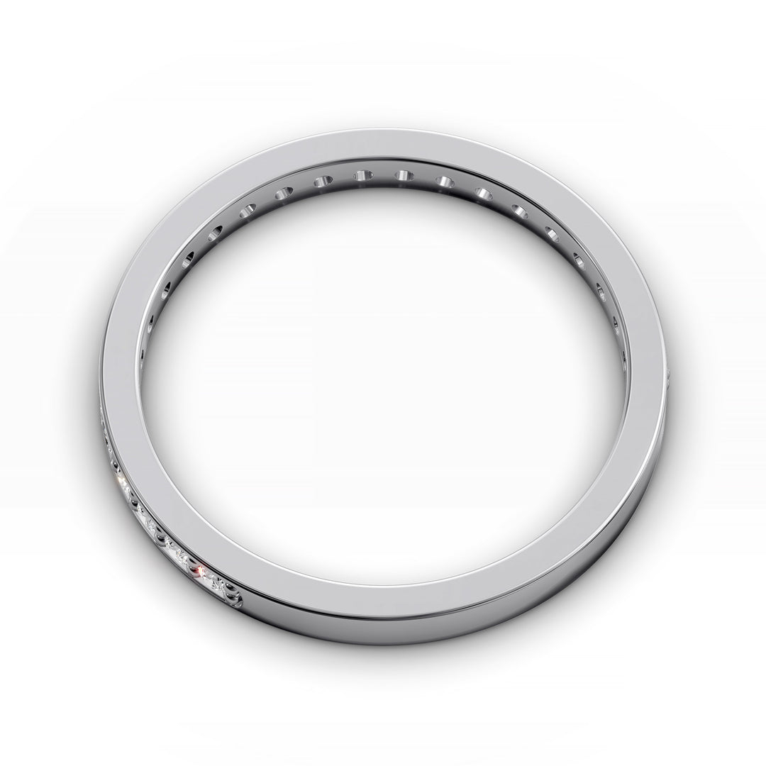 Channel set three-quarter eternity ring with round stones in polished gold