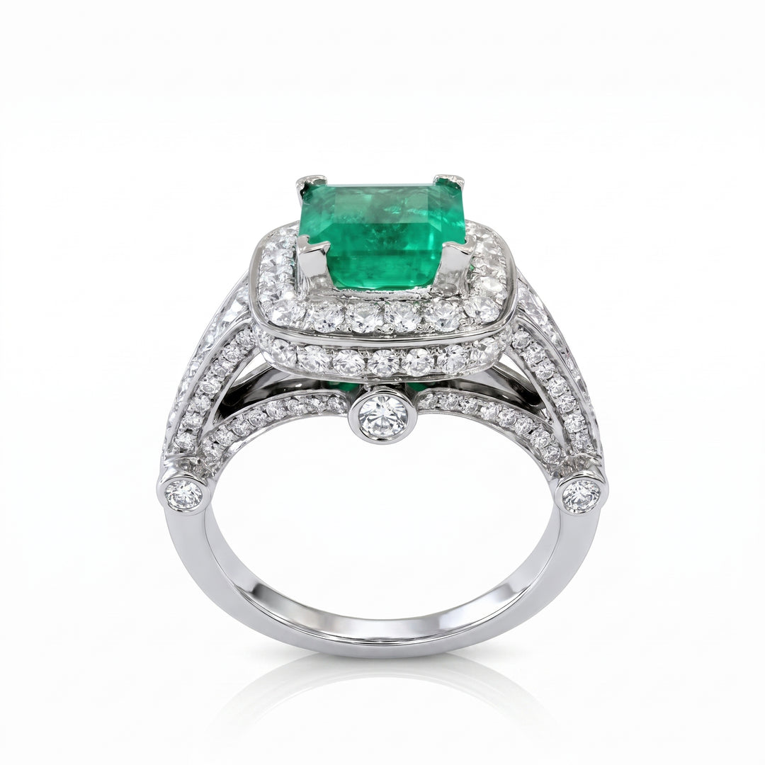 Vintage Colombian emerald ring with diamond halo in 14k white gold, 1.06ct emerald, 1.02ct diamonds.