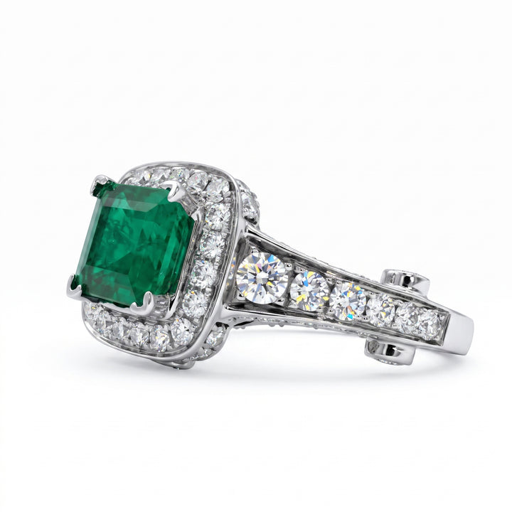Vintage Colombian emerald ring with diamond halo in 14k white gold, 1.06ct emerald, 1.02ct diamonds.