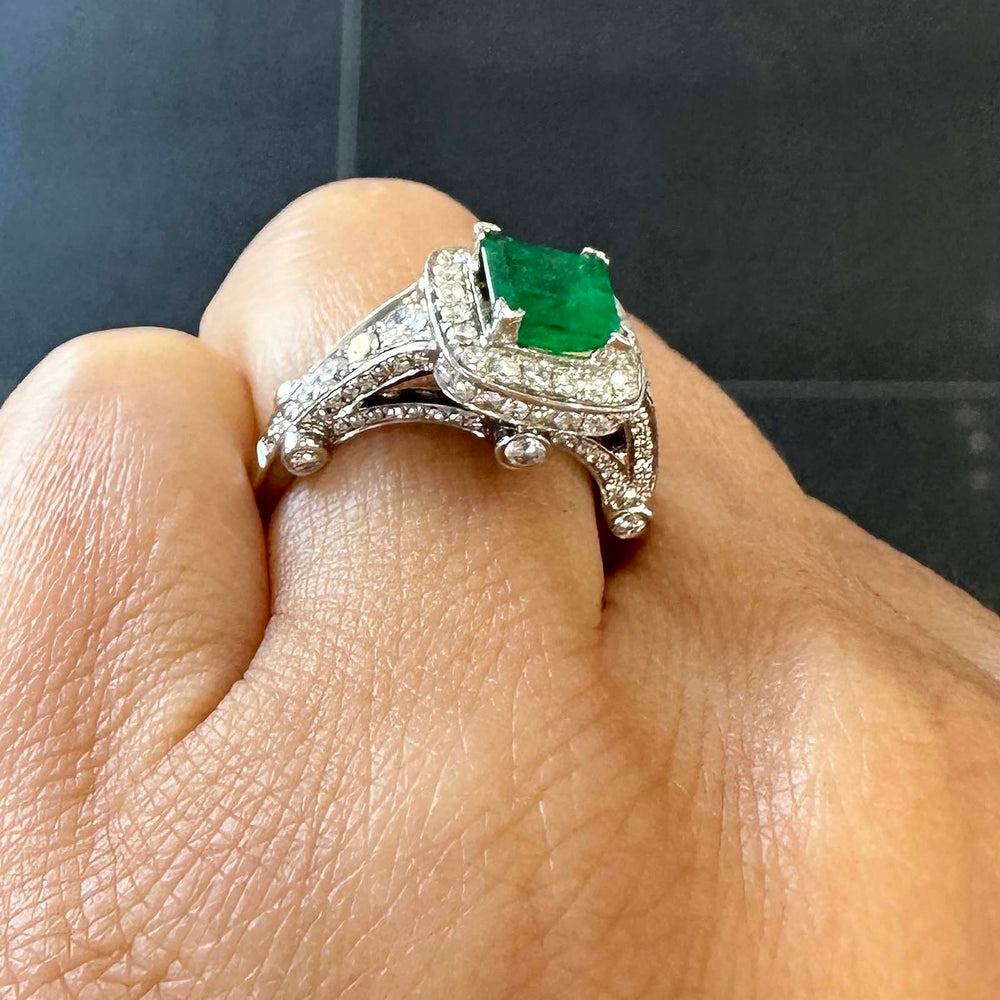Vintage Colombian emerald ring with diamond halo in 14k white gold, 1.06ct emerald, 1.02ct diamonds.