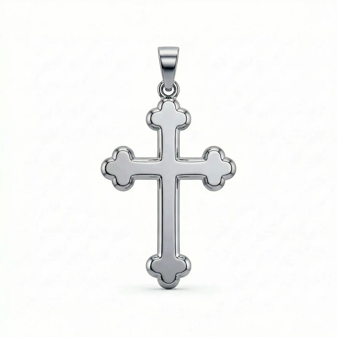 Cross fleury pendant necklace with fleur-shaped cross ends displayed on white background.