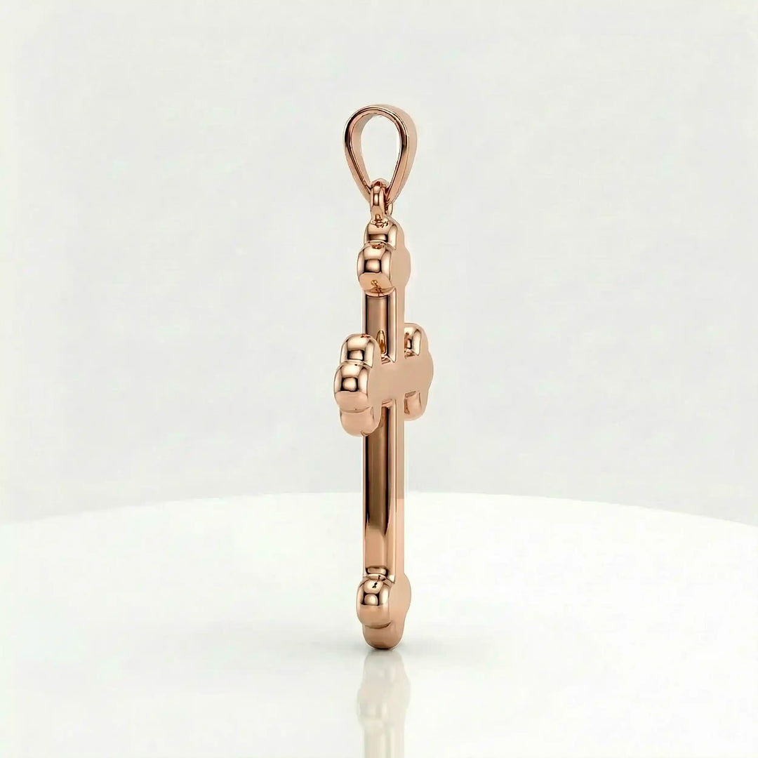 Cross fleury pendant necklace with fleur-shaped cross ends displayed on white background.