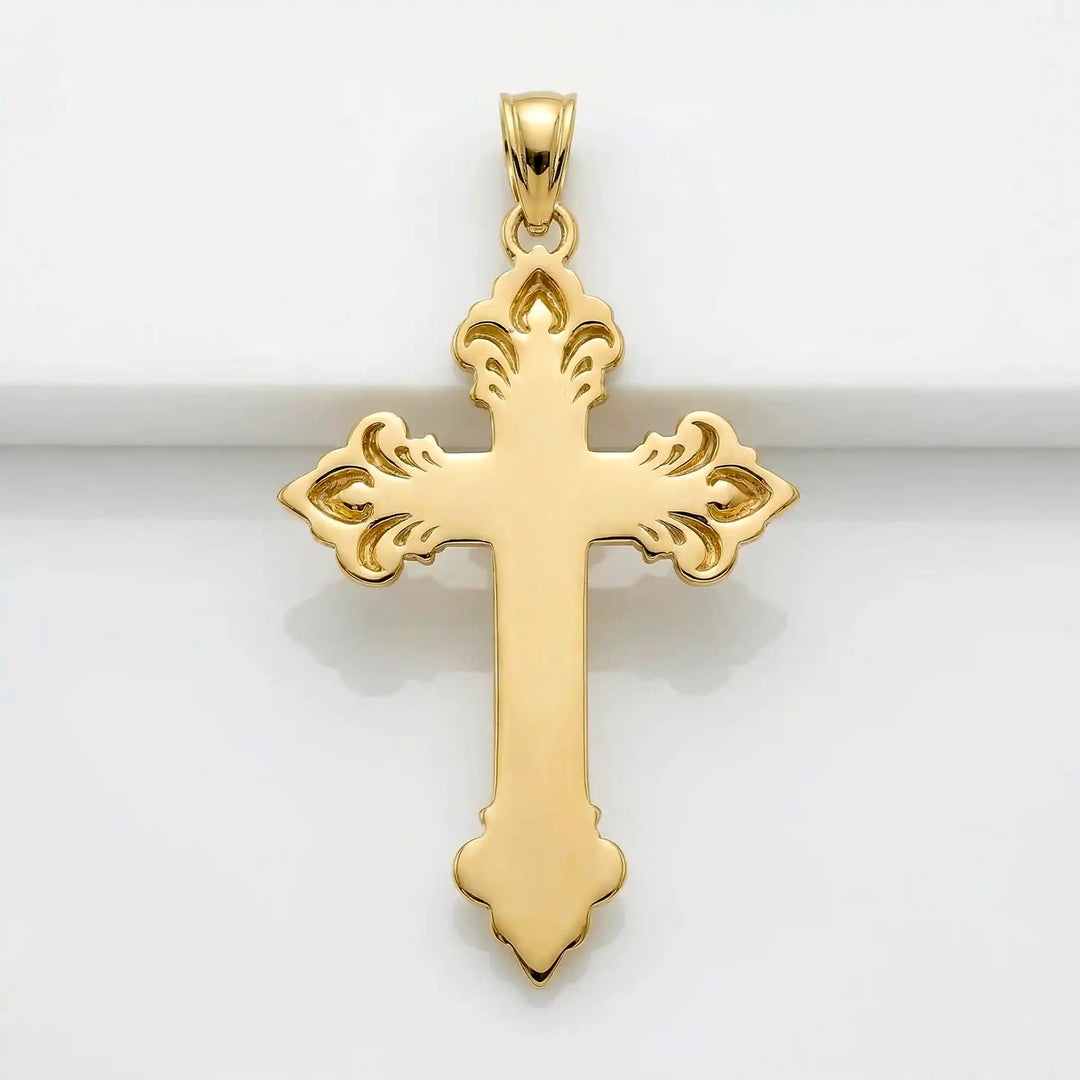 Crucifix cross pendant necklace with detailed Jesus Christ figure displayed on white background.
