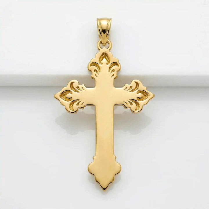 Crucifix cross pendant necklace with detailed Jesus Christ figure displayed on white background.