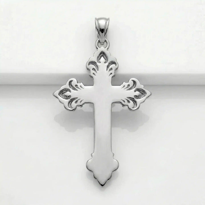 Crucifix cross pendant necklace with detailed Jesus Christ figure displayed on white background.