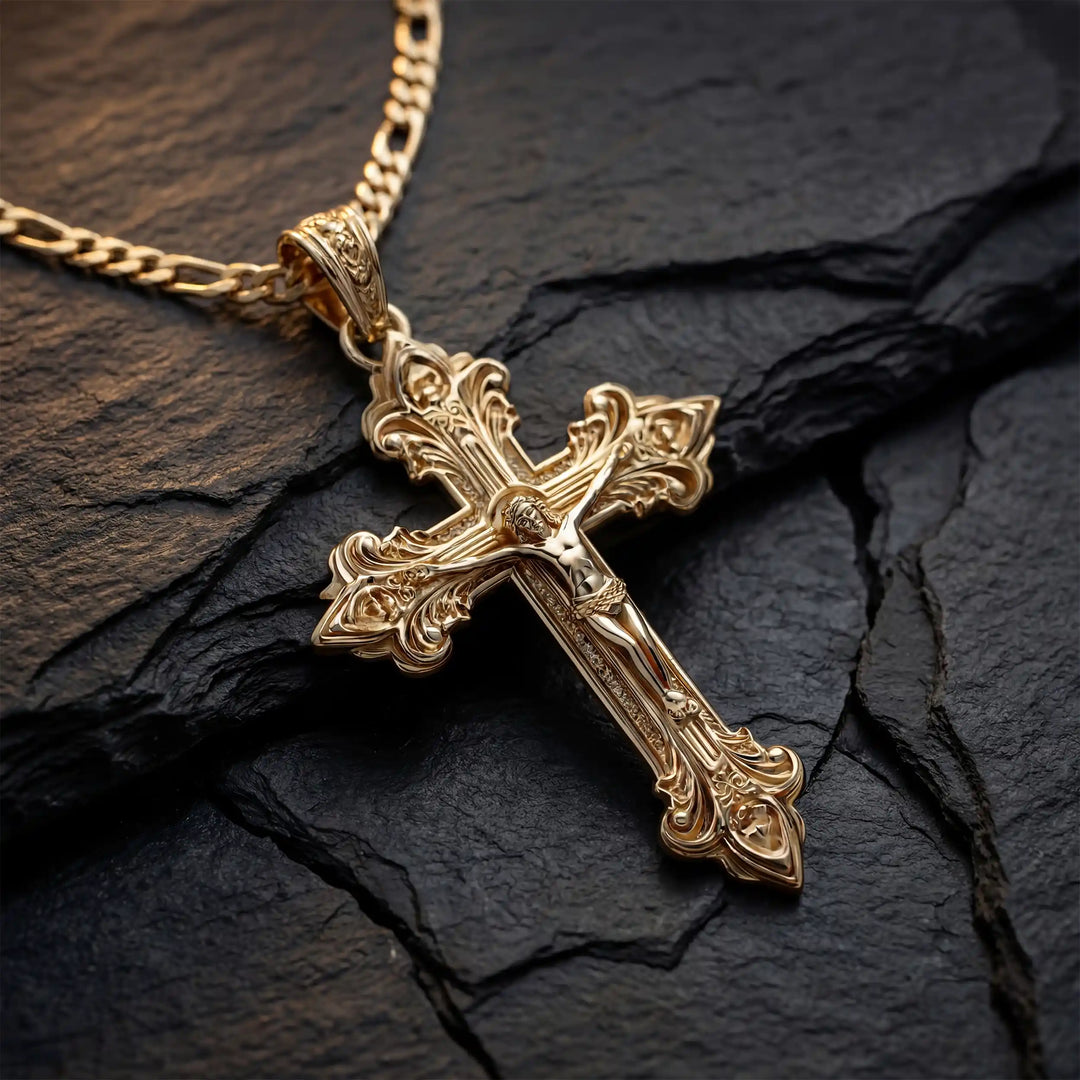 Crucifix cross pendant necklace with detailed Jesus Christ figure displayed on black stone.
