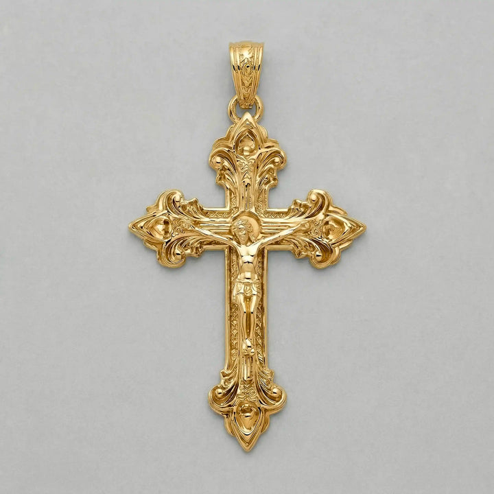 Crucifix cross pendant necklace with detailed Jesus Christ figure displayed on white background.