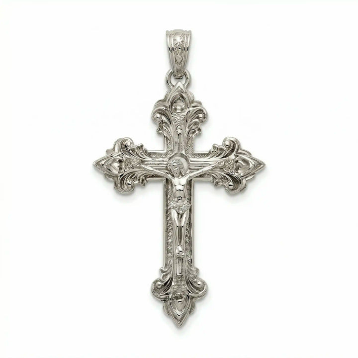 Crucifix cross pendant necklace with detailed Jesus Christ figure displayed on white background.