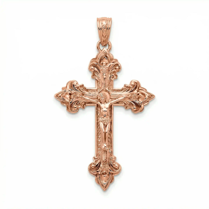 Crucifix cross pendant necklace with detailed Jesus Christ figure displayed on white background.