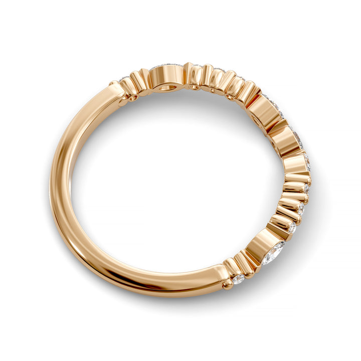 Curved wedding band with alternating marquise and round stones in gold