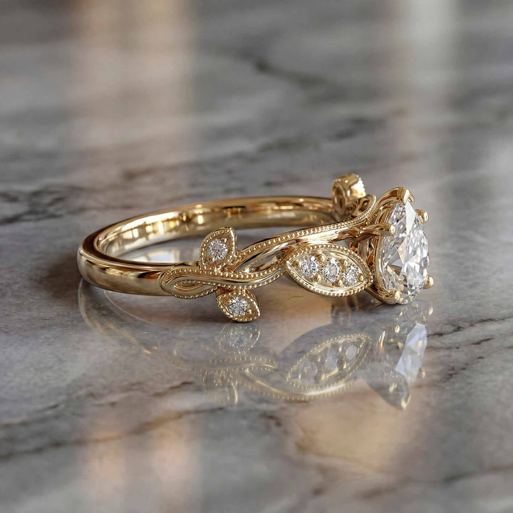 Curved wedding band with marquise and round lab-grown diamonds shown on reflective surface.