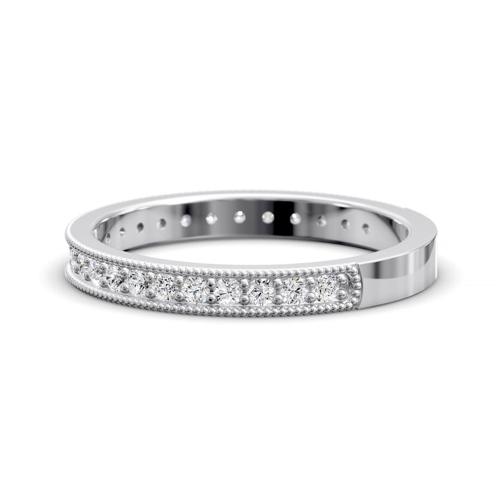 Channel set diamond wedding band with three-quarter eternity and beaded edge