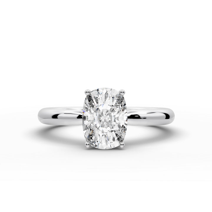 Elongated cushion diamond hidden halo cathedral engagement ring with half-round band shown in studio lighting.