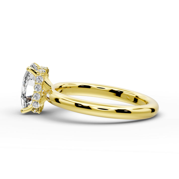 Elongated cushion diamond hidden halo cathedral engagement ring with half-round band shown in studio lighting.