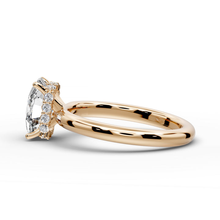 Elongated cushion diamond hidden halo cathedral engagement ring with half-round band shown in studio lighting.