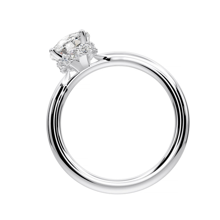 Elongated cushion diamond hidden halo cathedral engagement ring with half-round band shown in studio lighting.
