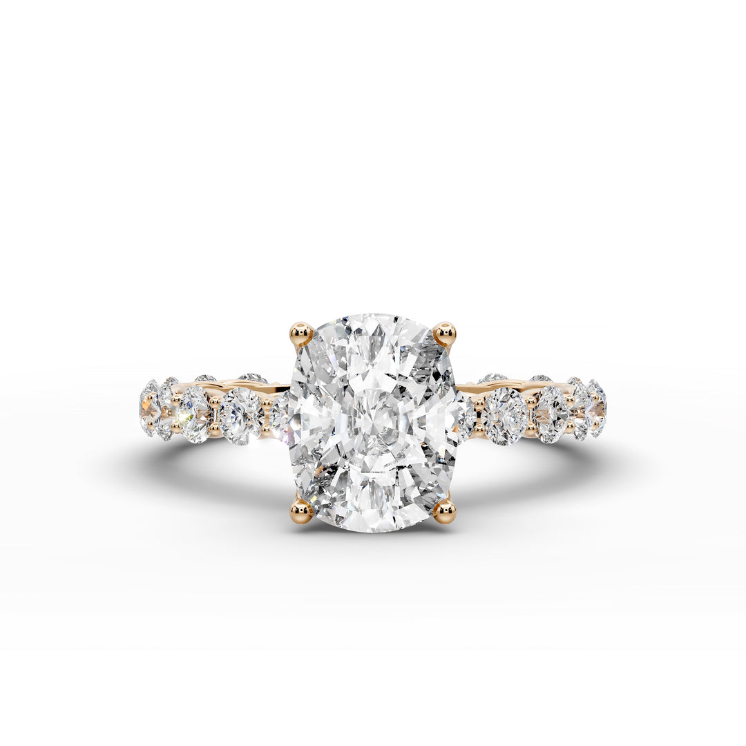 Elongated cushion diamond engagement ring with shared prong band shown in a studio display.