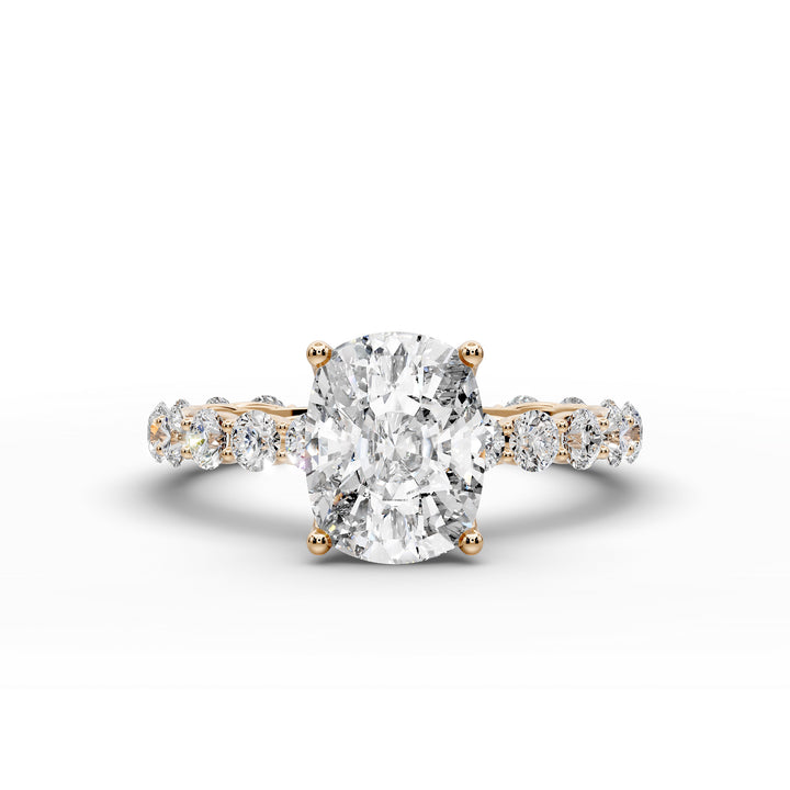 Elongated cushion diamond engagement ring with shared prong band shown in a studio display.
