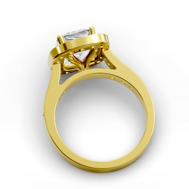 Emerald-cut diamond halo engagement ring with channel-set diamond band shown in studio lighting.