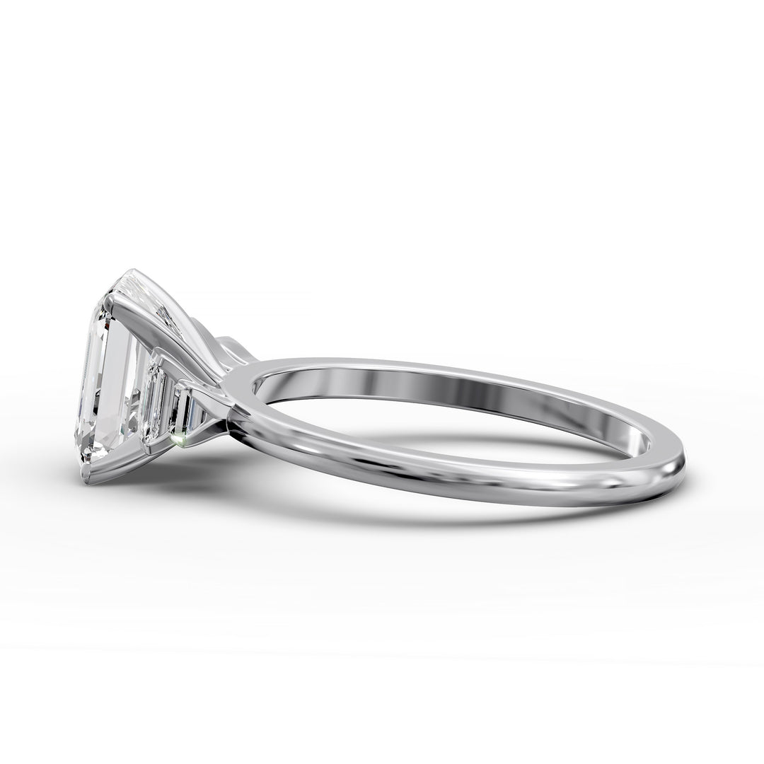 emerald-cut five-stone engagement ring with tapered baguette side diamonds shown from multiple angles