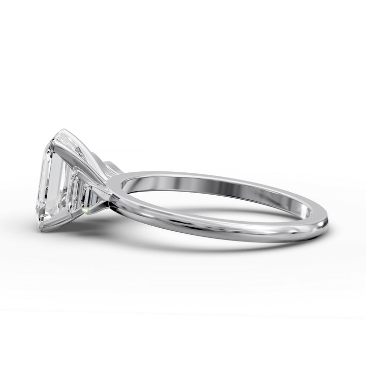 emerald-cut five-stone engagement ring with tapered baguette side diamonds shown from multiple angles