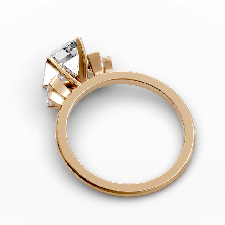 emerald-cut five-stone engagement ring with tapered baguette side diamonds shown from multiple angles