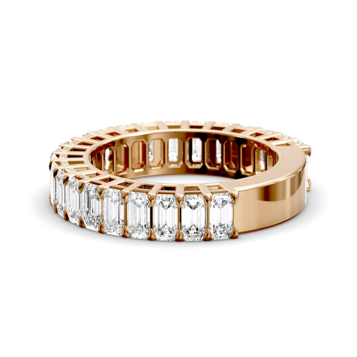 Emerald cut three-quarter eternity band with shared prong setting