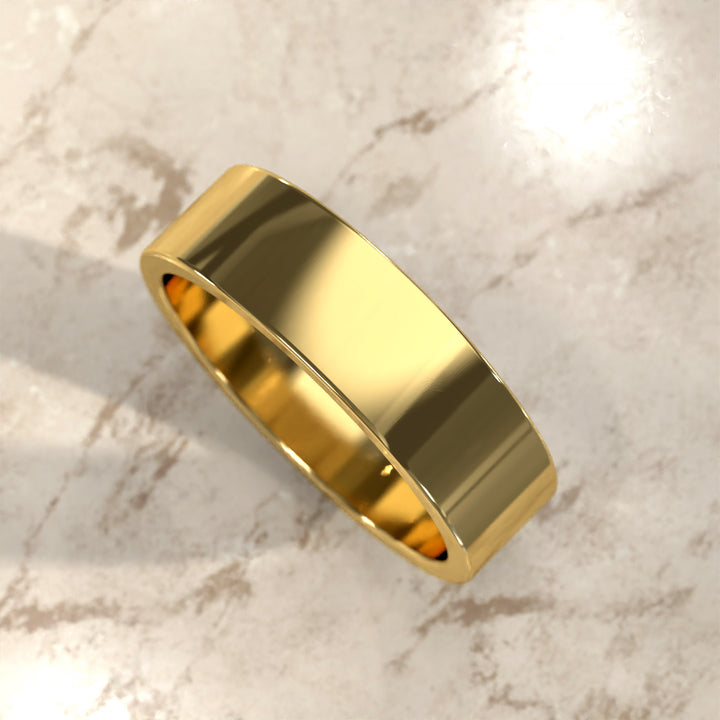 flat men’s comfort-fit wedding band with polished modern profile