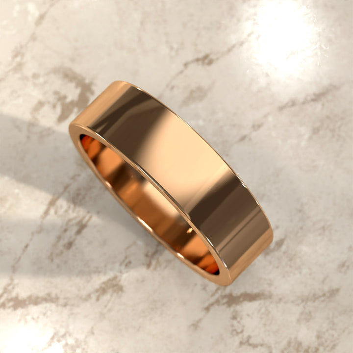 flat men’s comfort-fit wedding band with polished modern profile