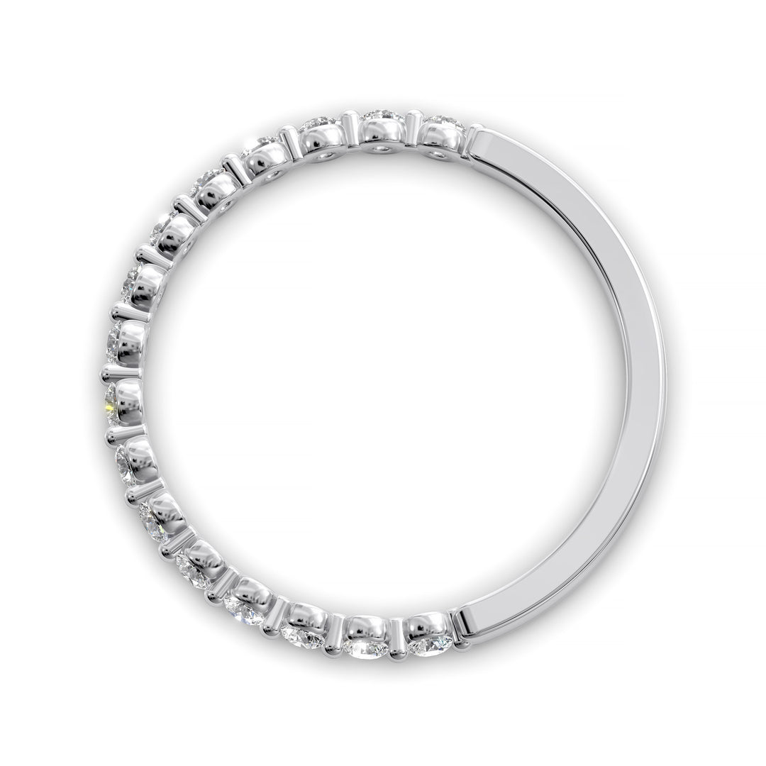 Floating diamond shared prong wedding band with round stones in gold