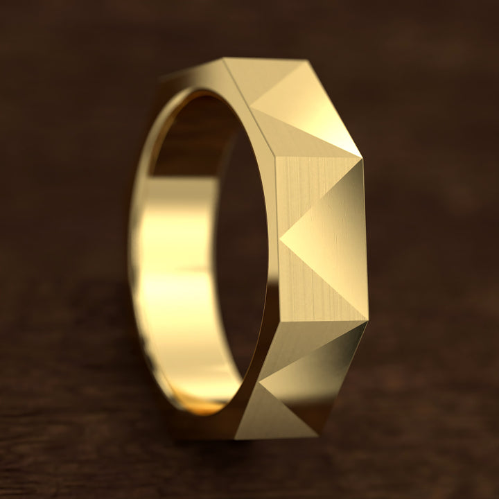 geometric faceted men’s band with brushed and polished planes
