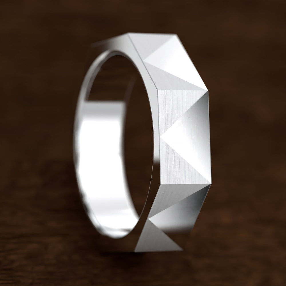 geometric faceted men’s band with brushed and polished planes