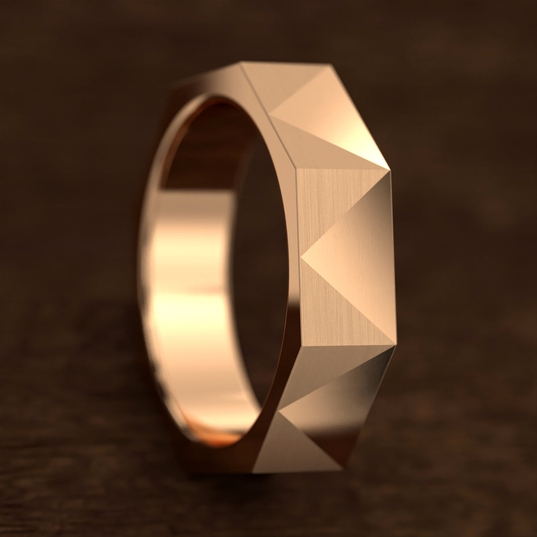geometric faceted men’s band with brushed and polished planes